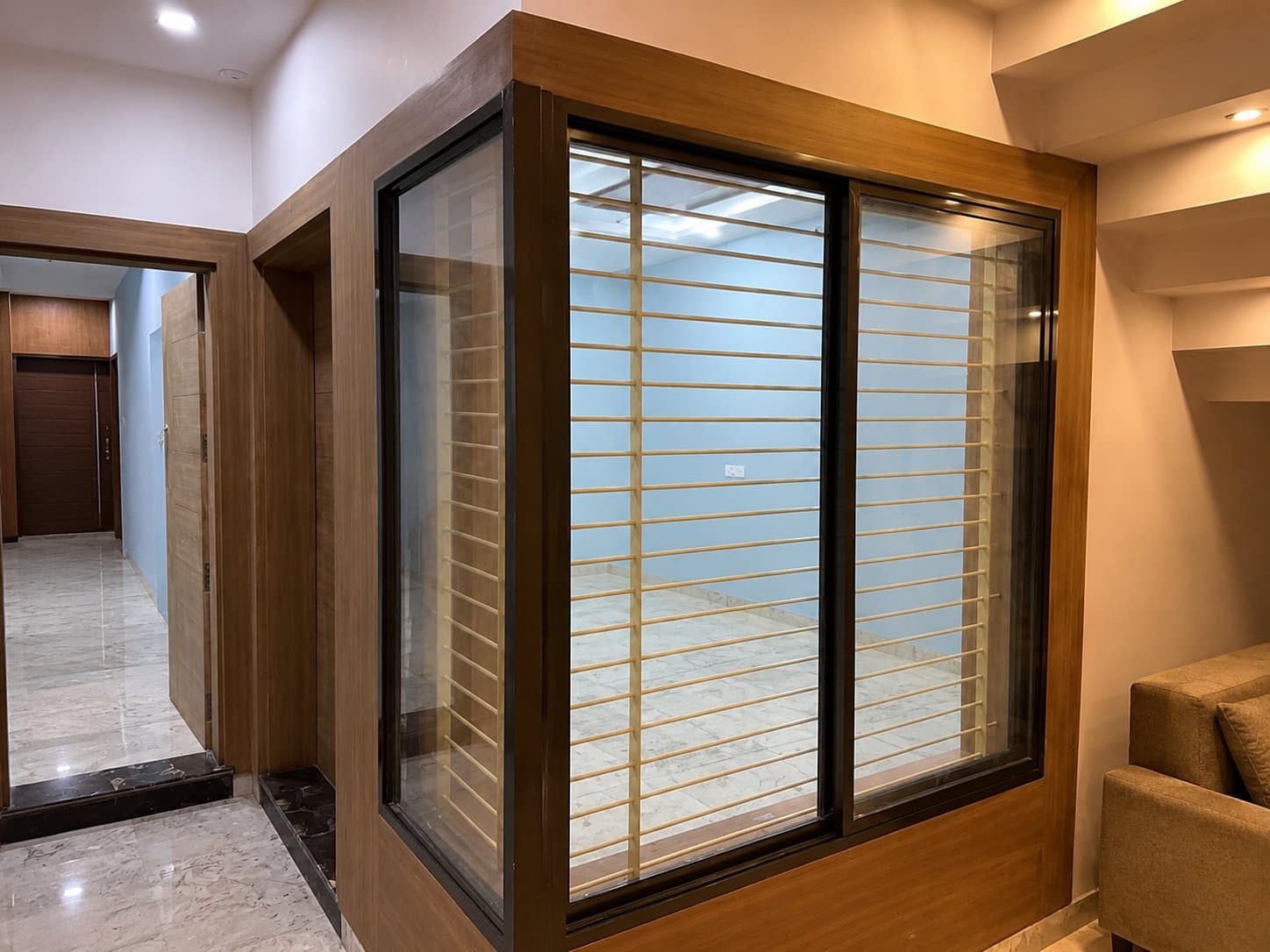 Sliding window with integrated grill